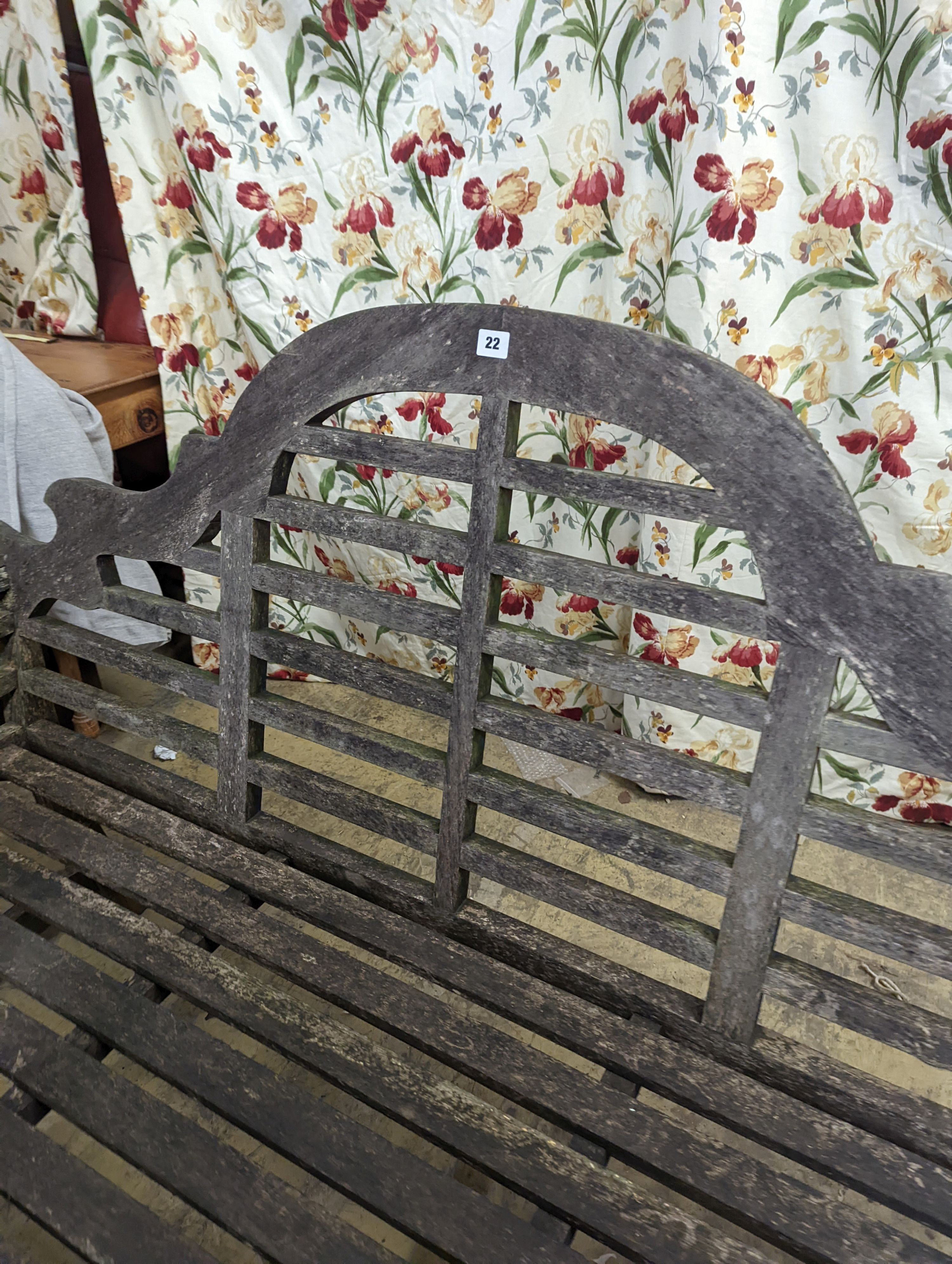 A pair of Lutyens style weathered teak garden benches, length 166cm, depth 53cm, height 105cm